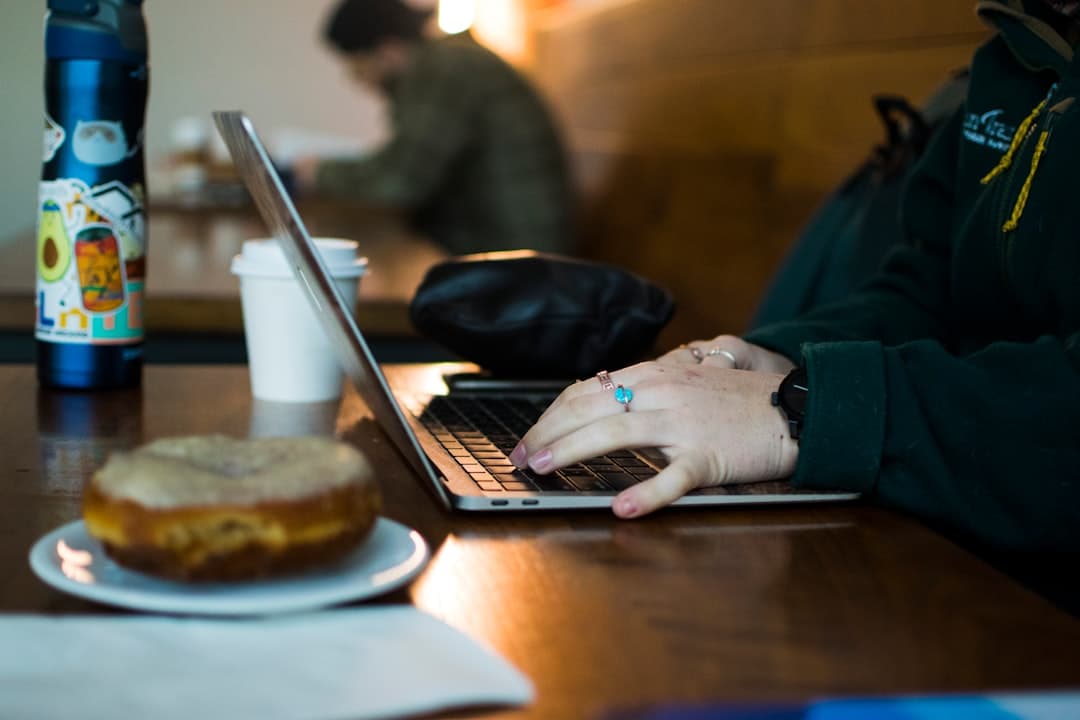 Entrepreneur working laptop cafe